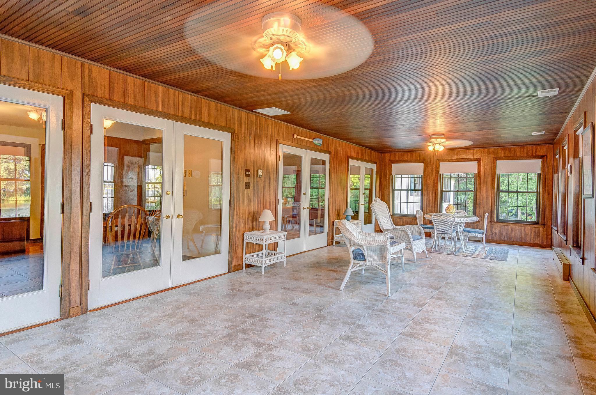 5966 Tyler Road Deale, MD 20751 - Photo 18 of 30 a living room with furniture and large windows