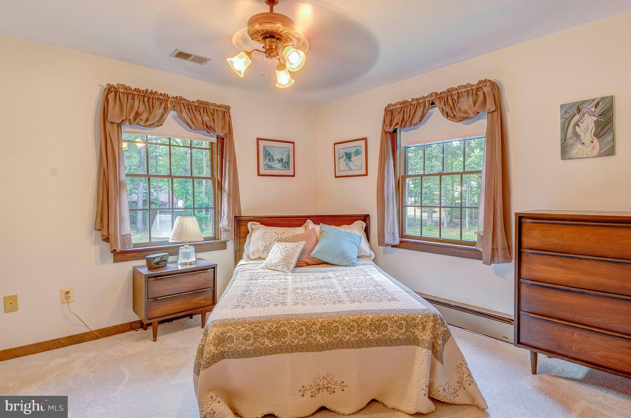 5966 Tyler Road Deale, MD 20751 - Photo 23 of 30 a bed room with a bed and a window