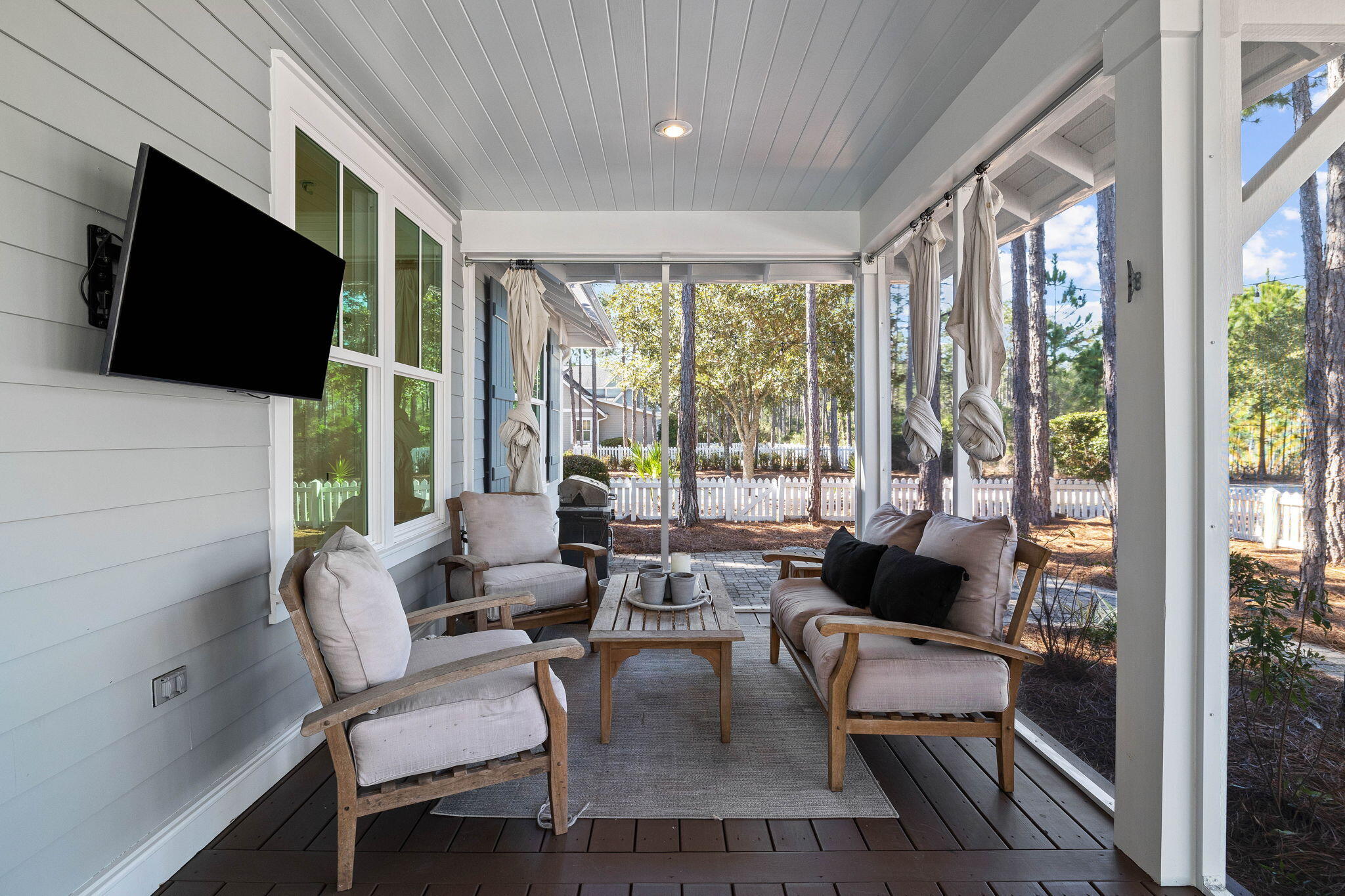 821 Breakers Street Inlet Beach, FL 32461 - Photo 25 of 69 a living room with fireplace furniture and a flat screen tv