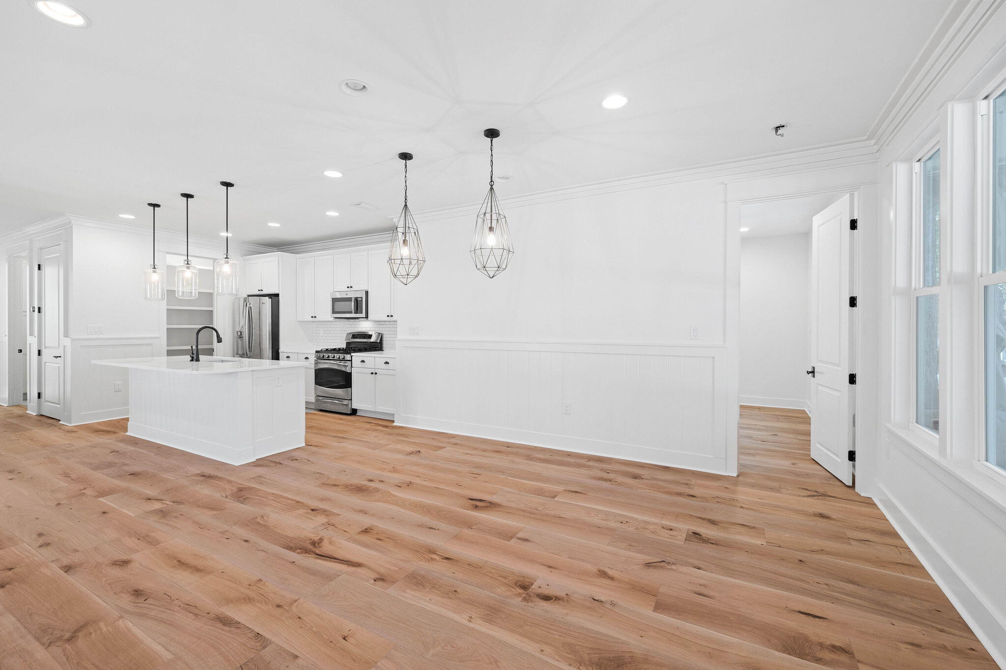821 Breakers Street Inlet Beach, FL 32461 - Photo 36 of 69 a view of kitchen with kitchen island white cabinets and stainless steel appliances