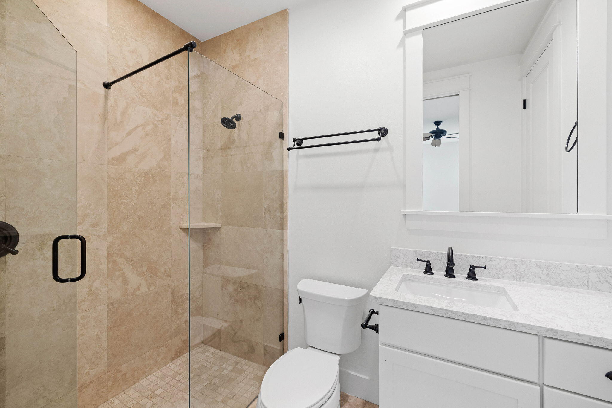 821 Breakers Street Inlet Beach, FL 32461 - Photo 44 of 69 a bathroom with a shower sink vanity and toilet