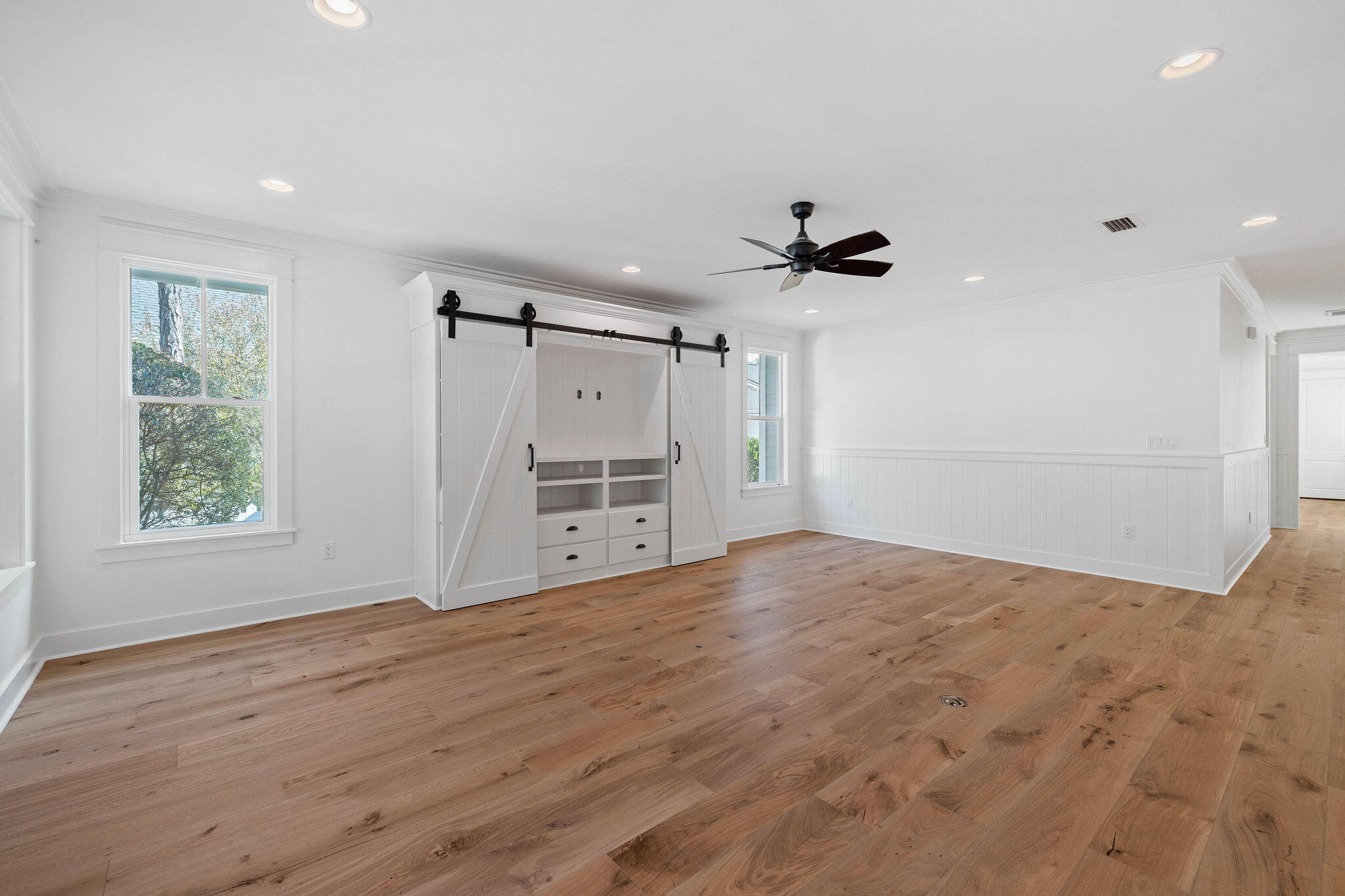 821 Breakers Street Inlet Beach, FL 32461 - Photo 48 of 69 a view of empty room with a ceiling fan and window