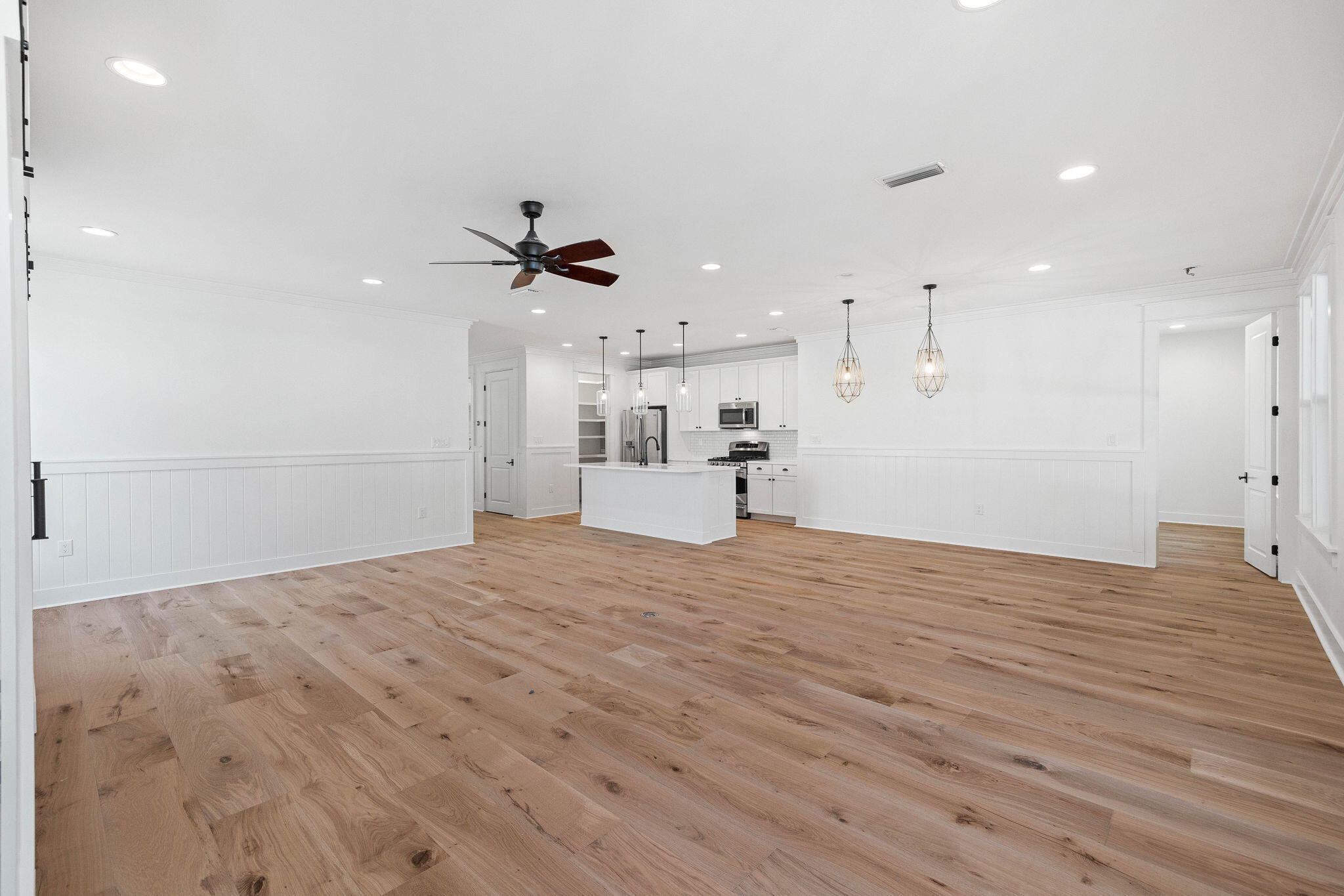 821 Breakers Street Inlet Beach, FL 32461 - Photo 51 of 69 a view of a kitchen with a sink and a refrigerator