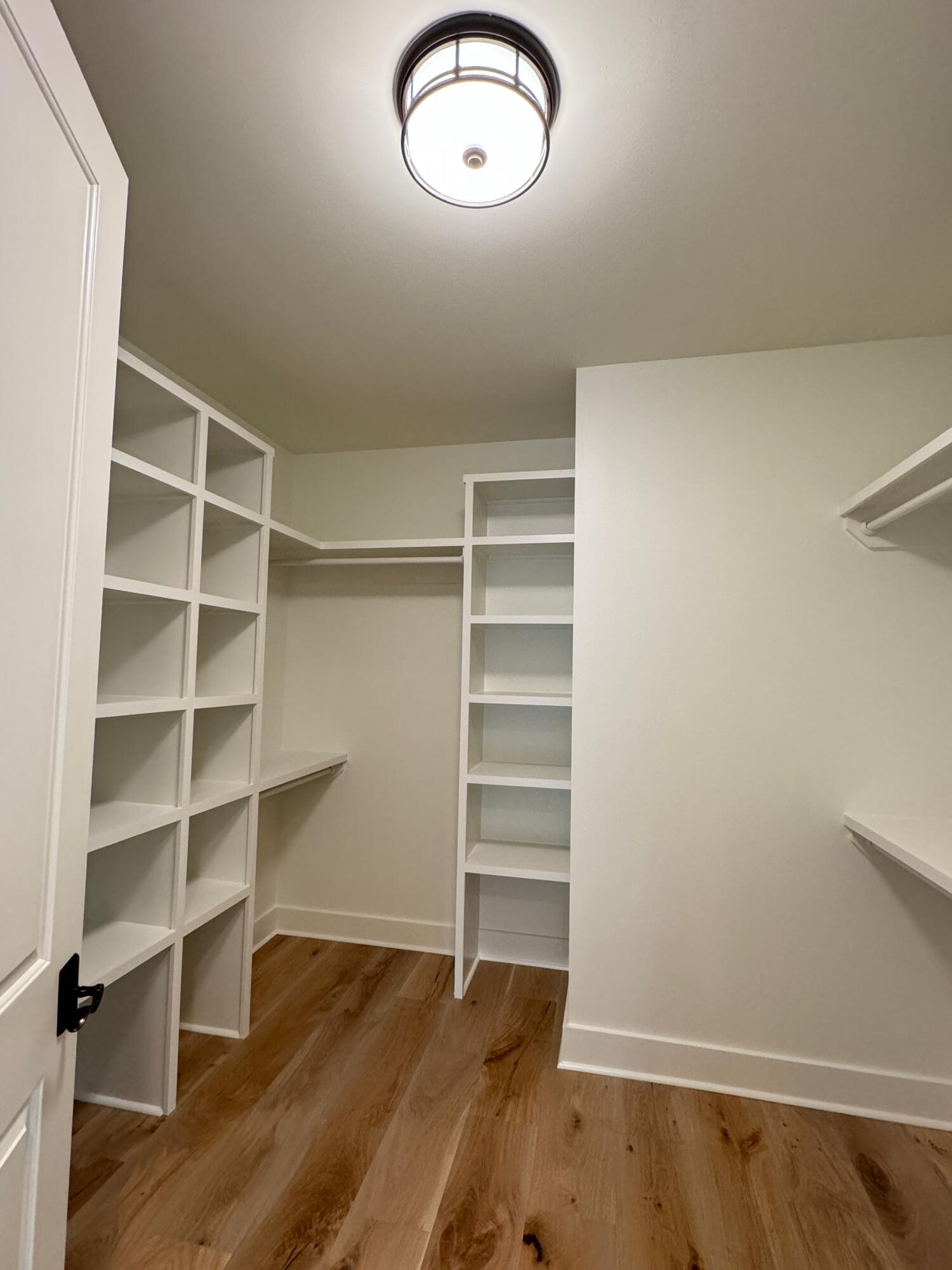 821 Breakers Street Inlet Beach, FL 32461 - Photo 57 of 69 a view of a room with storage and racks on wall