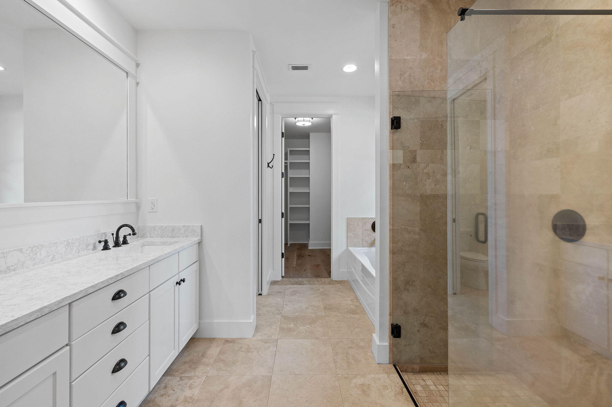 821 Breakers Street Inlet Beach, FL 32461 - Photo 59 of 69 a bathroom with a double vanity sink a toilet and shower