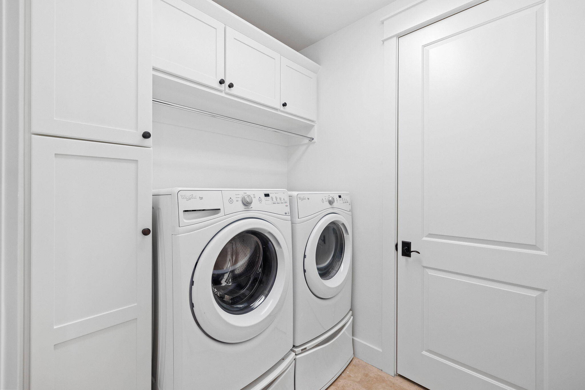 821 Breakers Street Inlet Beach, FL 32461 - Photo 61 of 69 a utility room with dryer and washer
