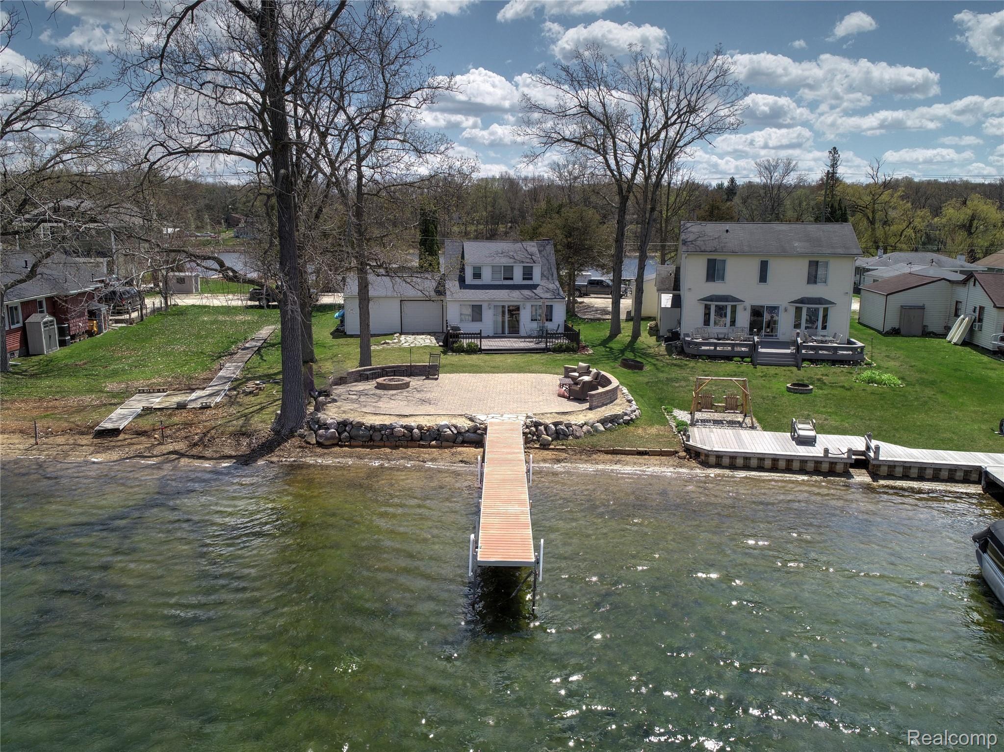 Professionally installed permanent dock (2018).  Plenty of Room for the Pontoon, Wakeboard Boat and Jet Ski's. 