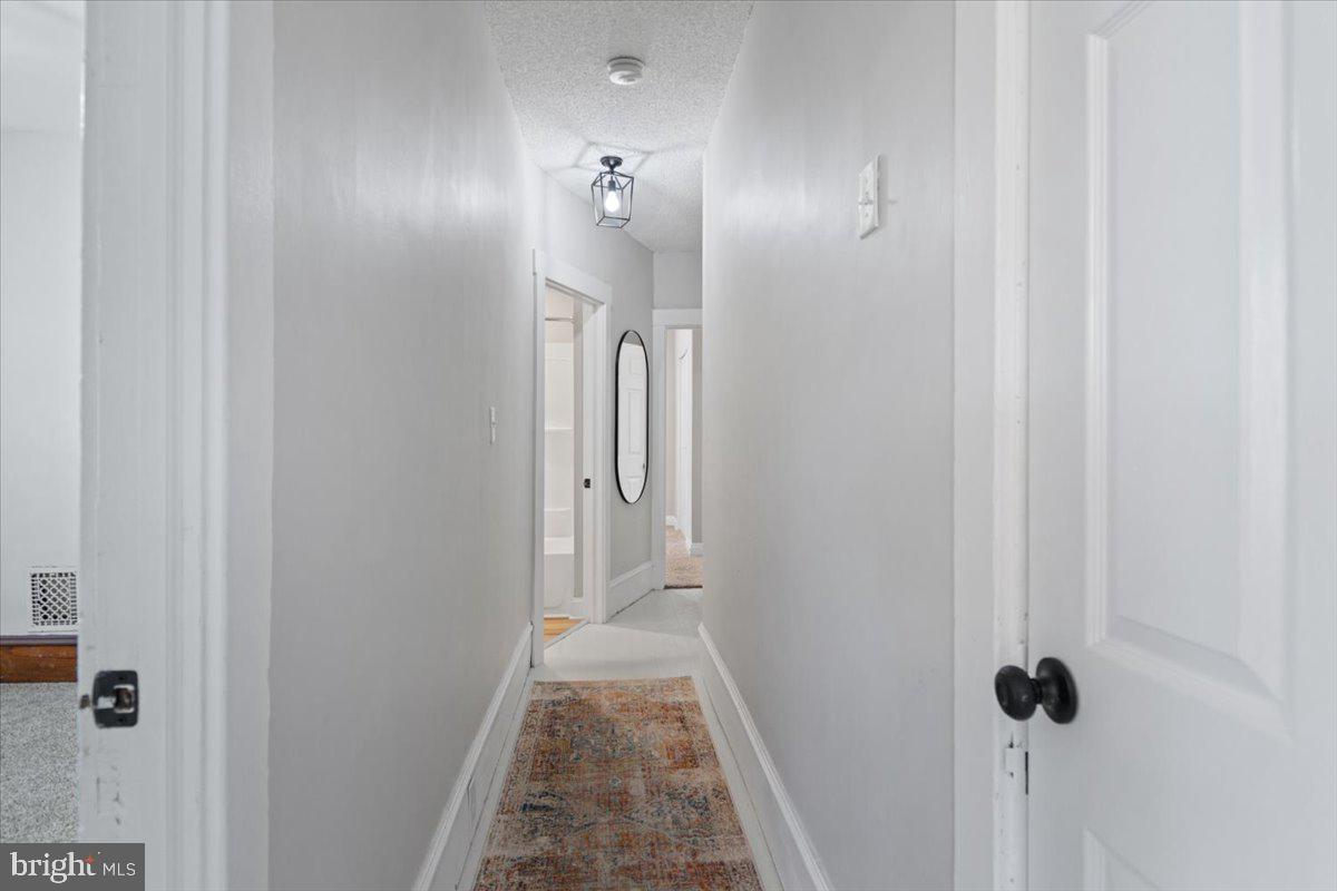 158 Lafayette Road Audubon, NJ 08106 - Photo 22 of 29 Inviting hallway with natural light.