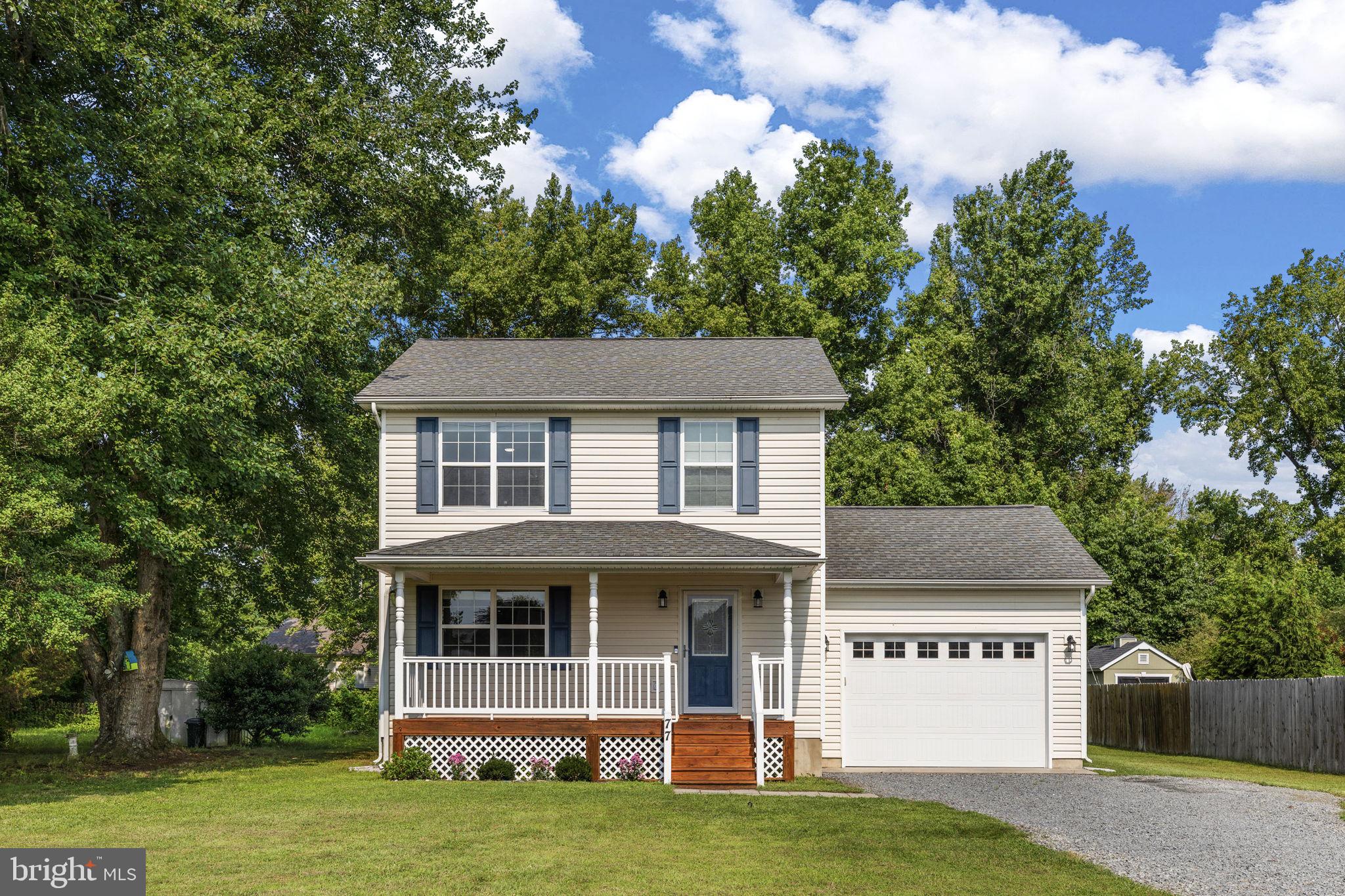Charming home with inviting porch.