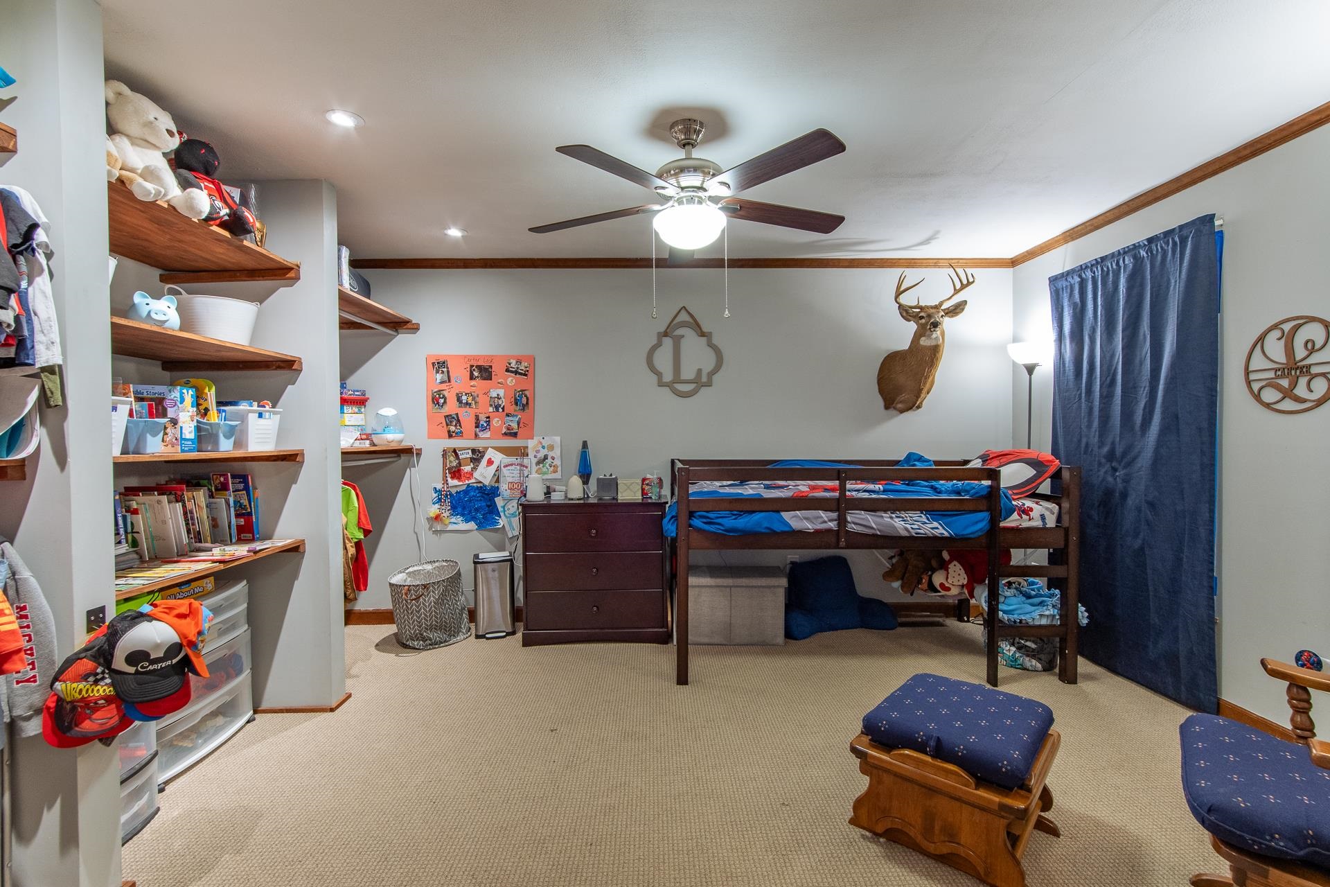 255 Easley Loop Savannah, TN 38372 - Photo 17 of 40 a living room with furniture a piano and a bookshelf