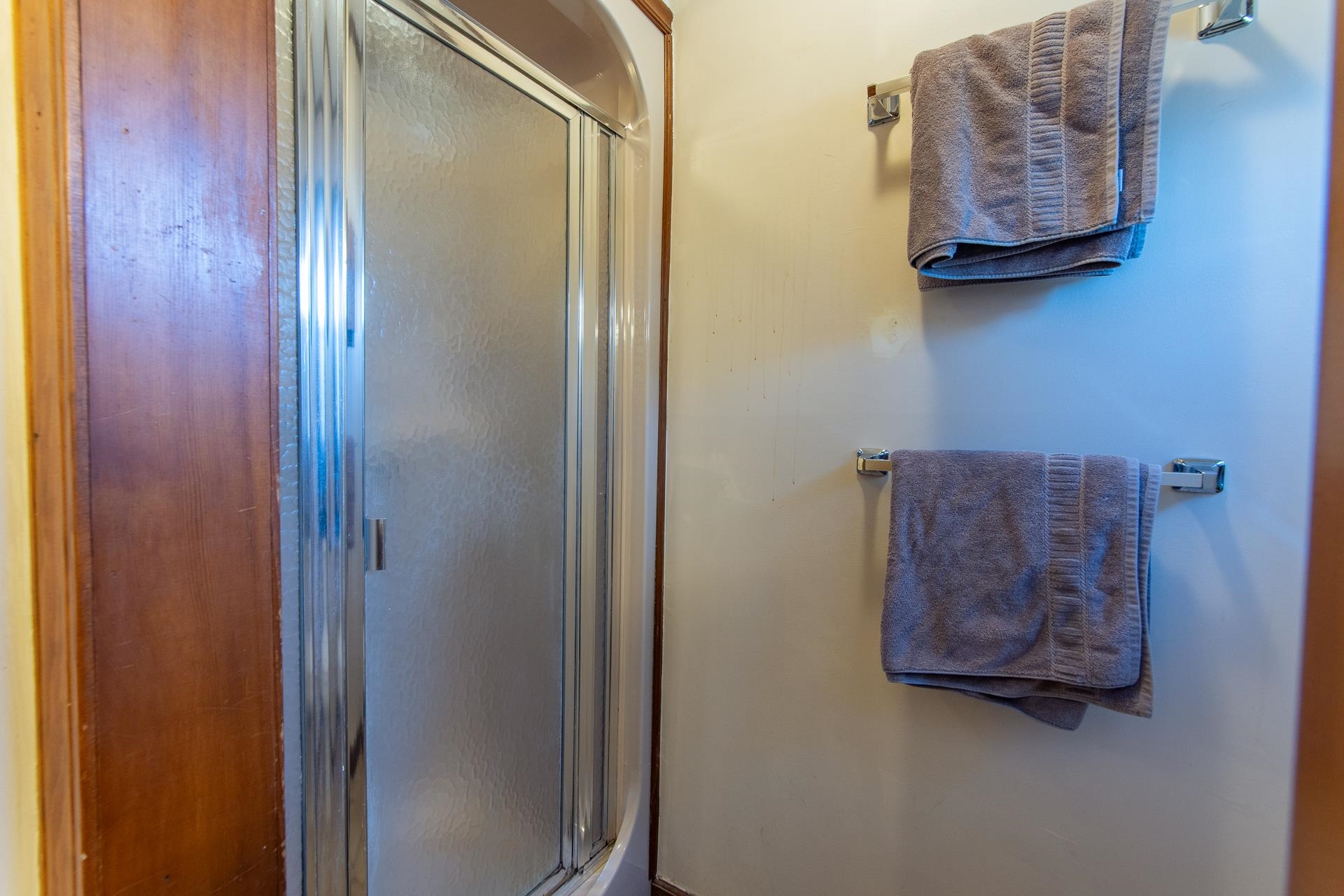 255 Easley Loop Savannah, TN 38372 - Photo 22 of 40 a bathroom with a granite countertop sink a mirror and vanity