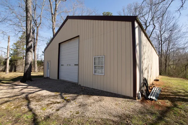 a view of a yard with a house