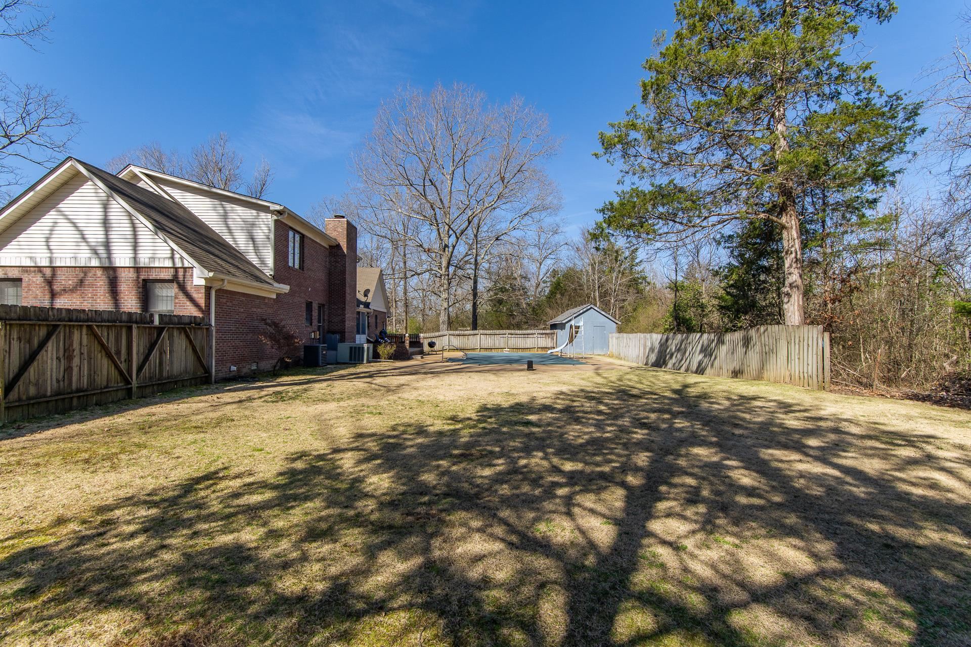 255 Easley Loop Savannah, TN 38372 - Photo 33 of 40 a view of a yard with a house