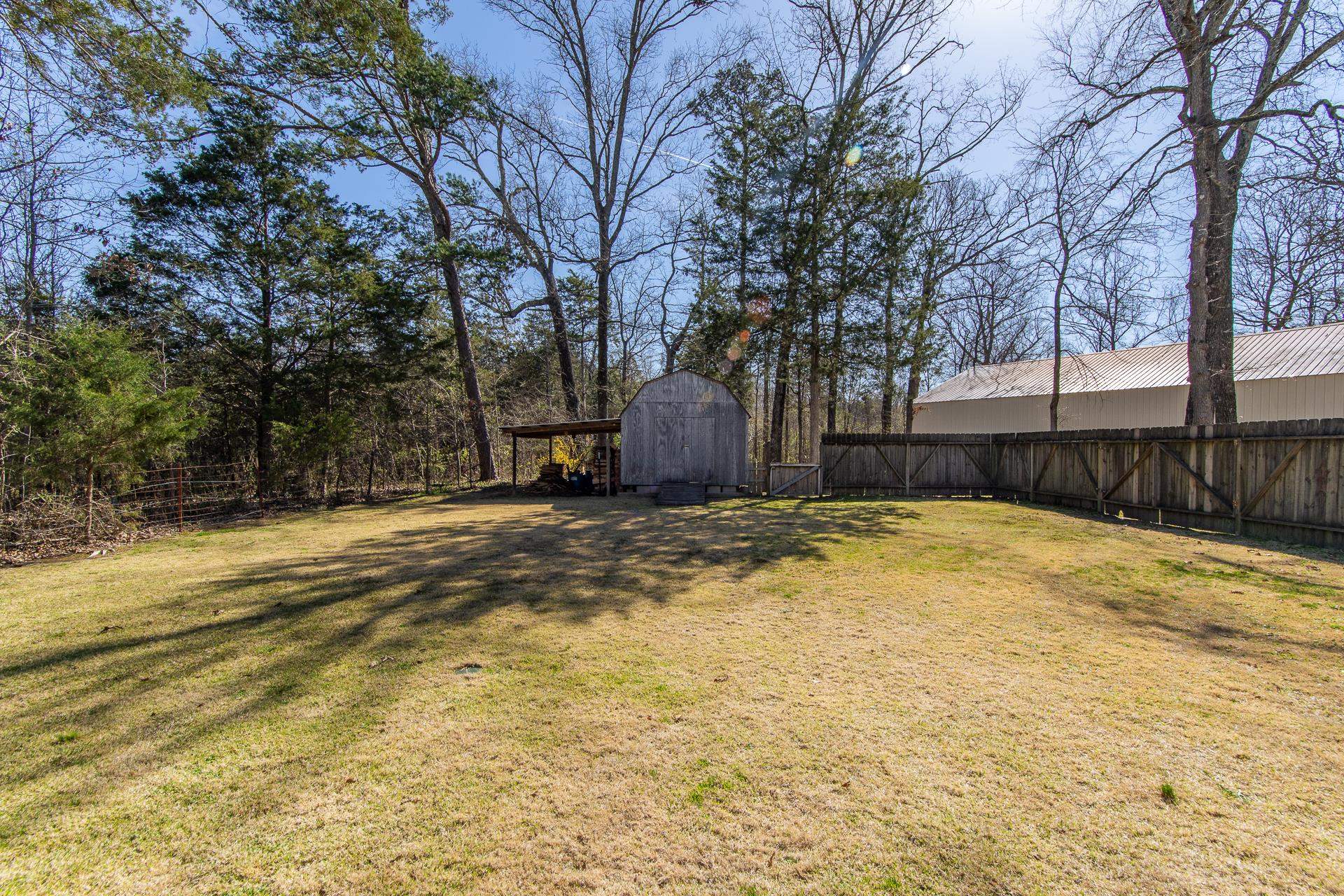 255 Easley Loop Savannah, TN 38372 - Photo 34 of 40 a view of large pool with large trees