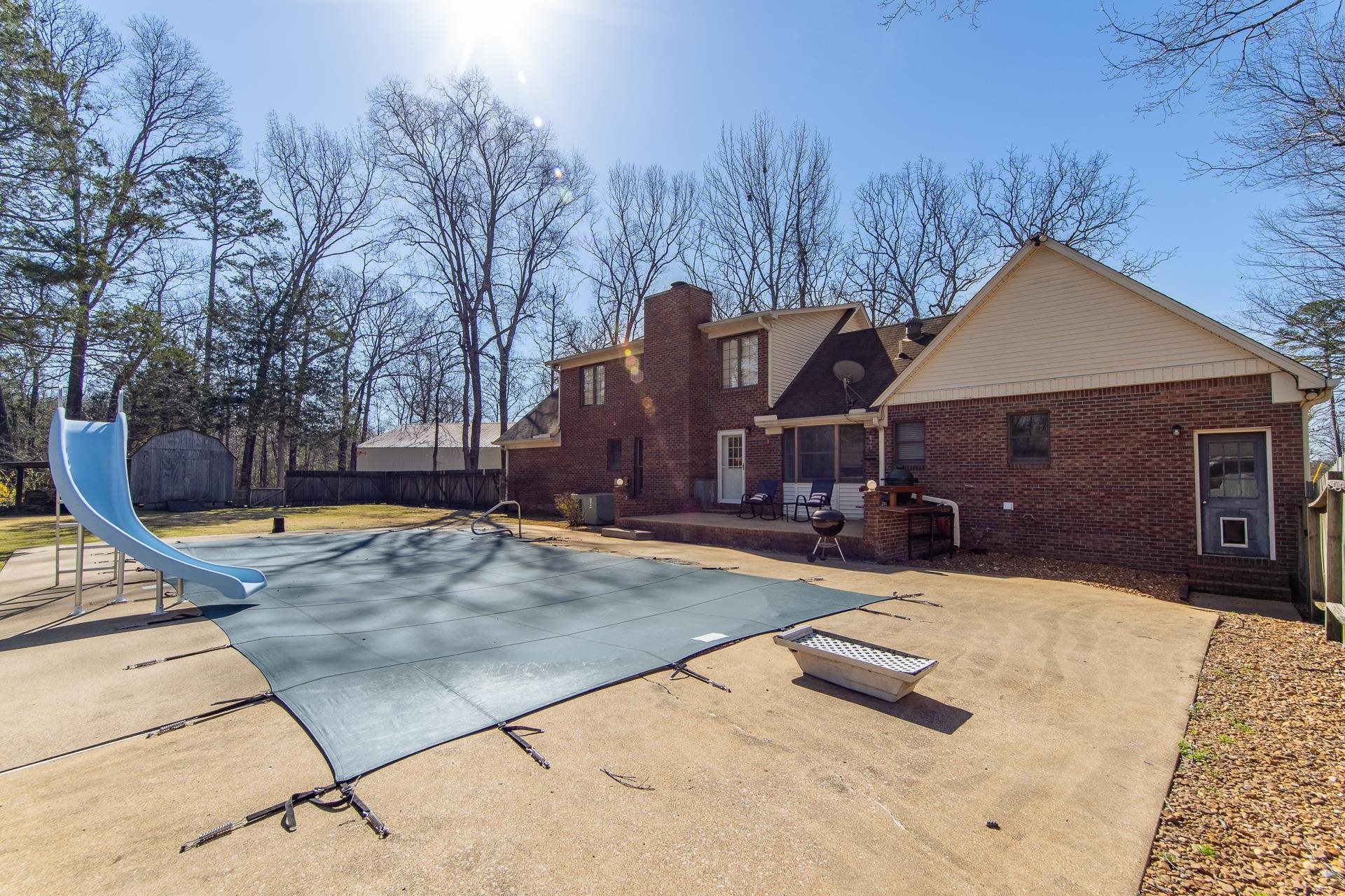 255 Easley Loop Savannah, TN 38372 - Photo 36 of 40 a view of a house with basketball court