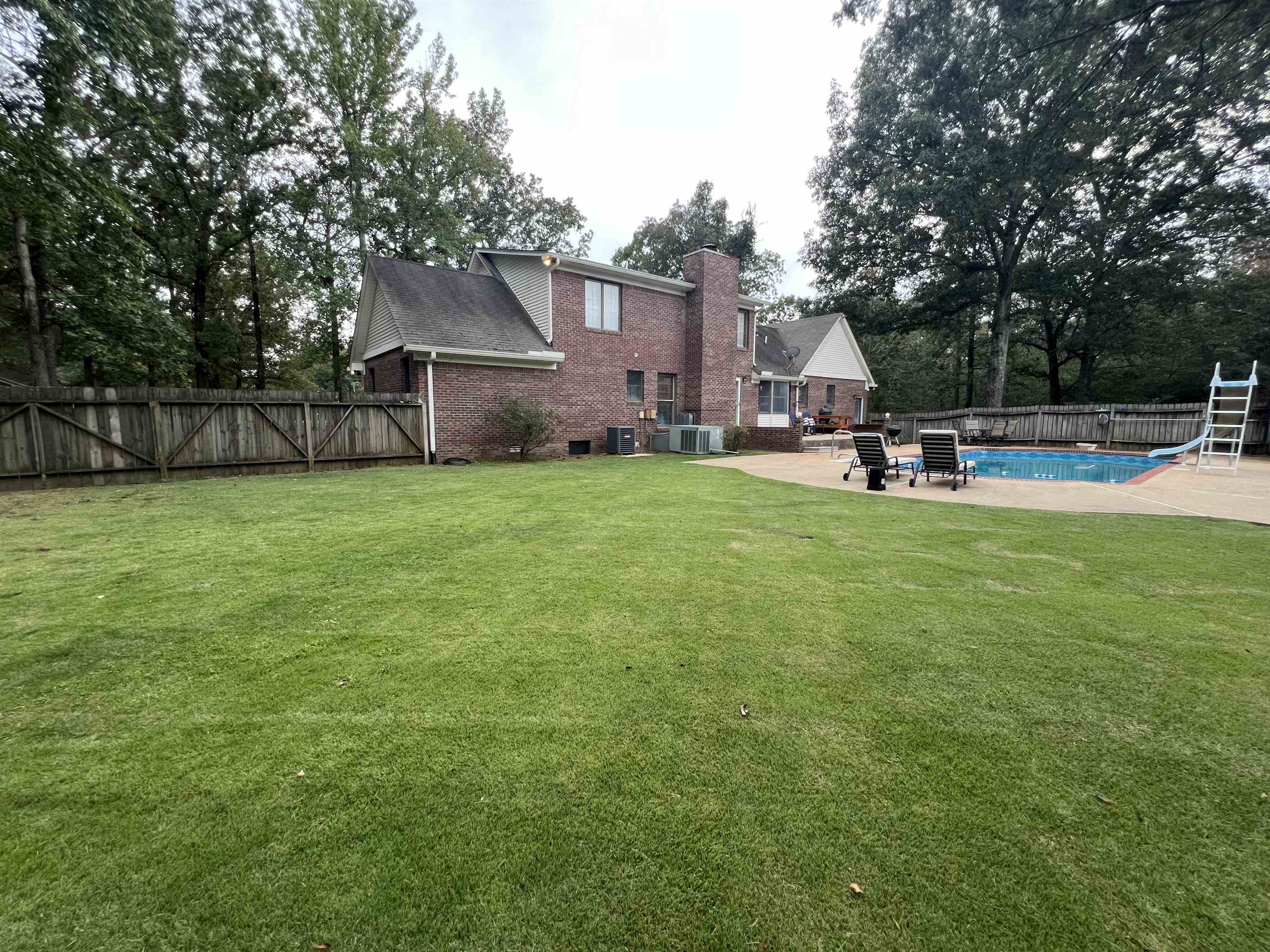 255 Easley Loop Savannah, TN 38372 - Photo 4 of 40 a view of a house with a yard and sitting area