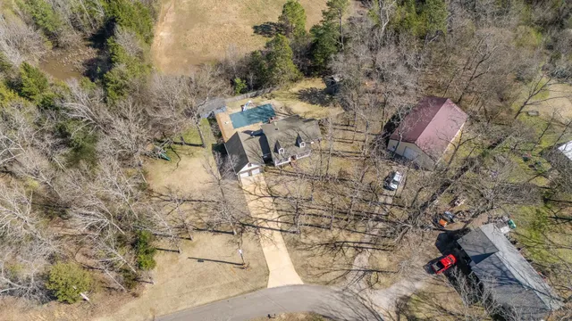 a living room with furniture flat screen tv and a fireplace