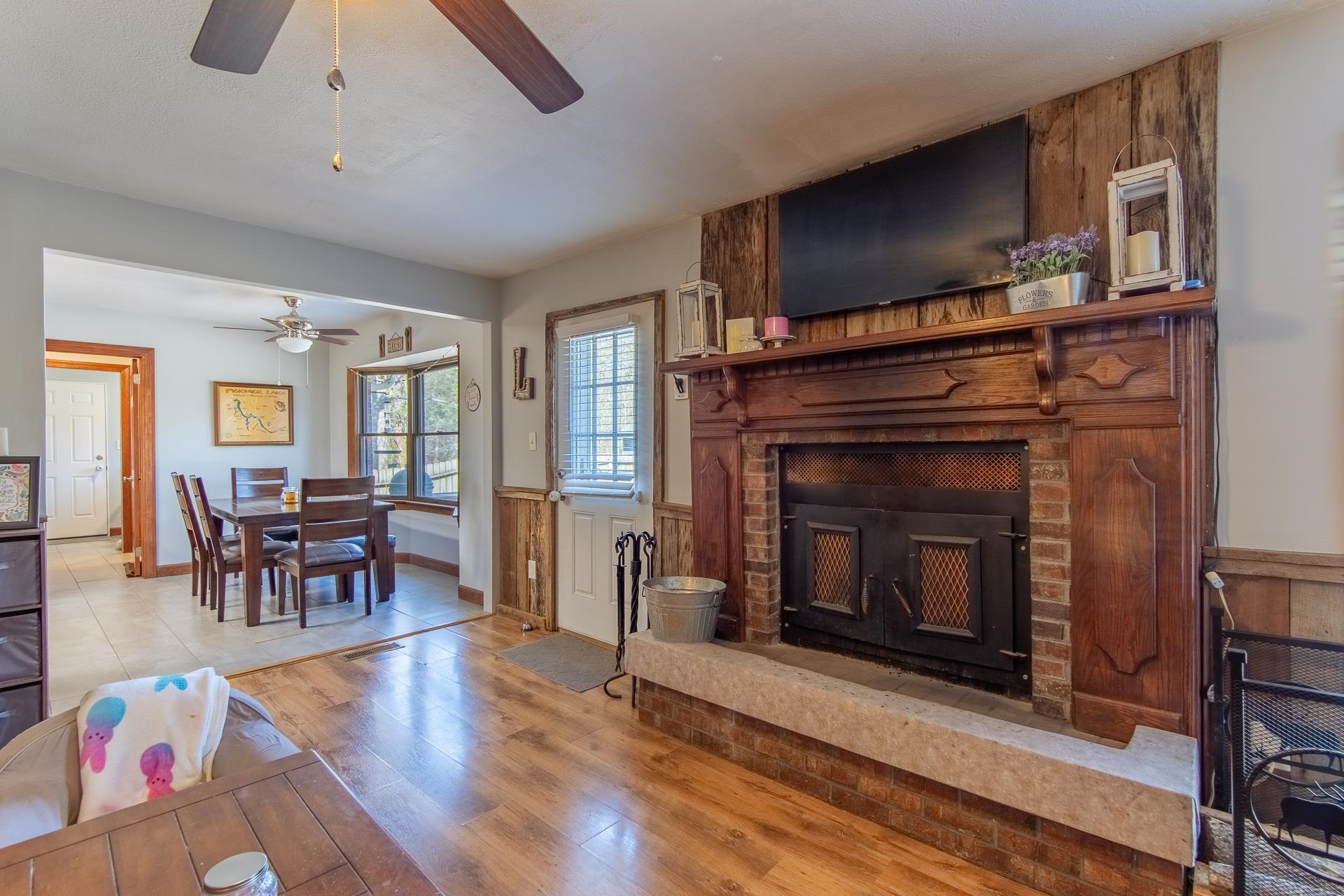 255 Easley Loop Savannah, TN 38372 - Photo 8 of 40 a living room with furniture flat screen tv and a fireplace