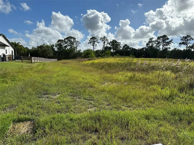 a view of a golf course with a lake