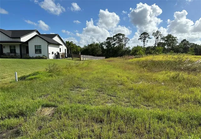 a view of house with garden