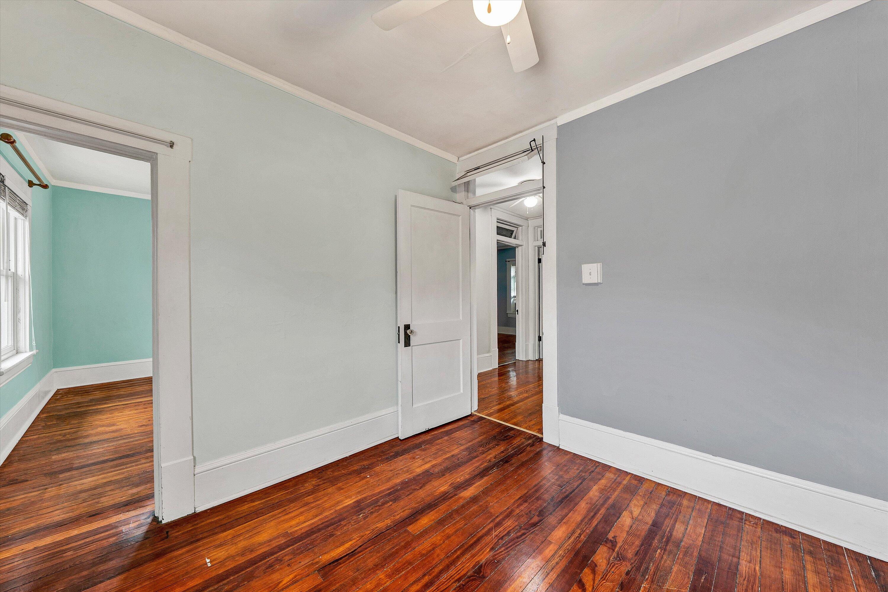 1609 6th Street Southwest Roanoke, VA 24016 - Photo 27 of 43 wooden floor in an empty room with a window