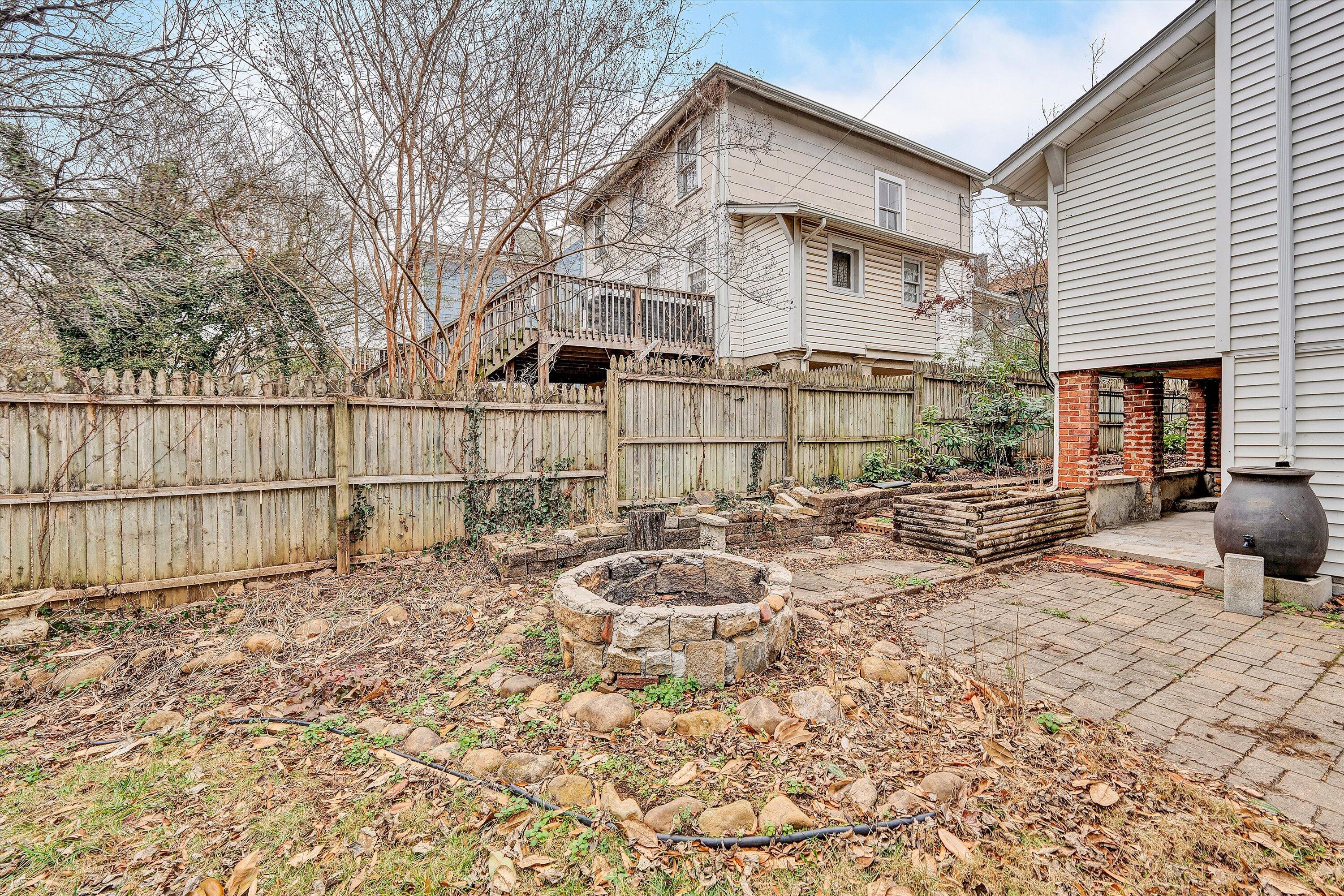 1609 6th Street Southwest Roanoke, VA 24016 - Photo 34 of 43 a white building with a large tree