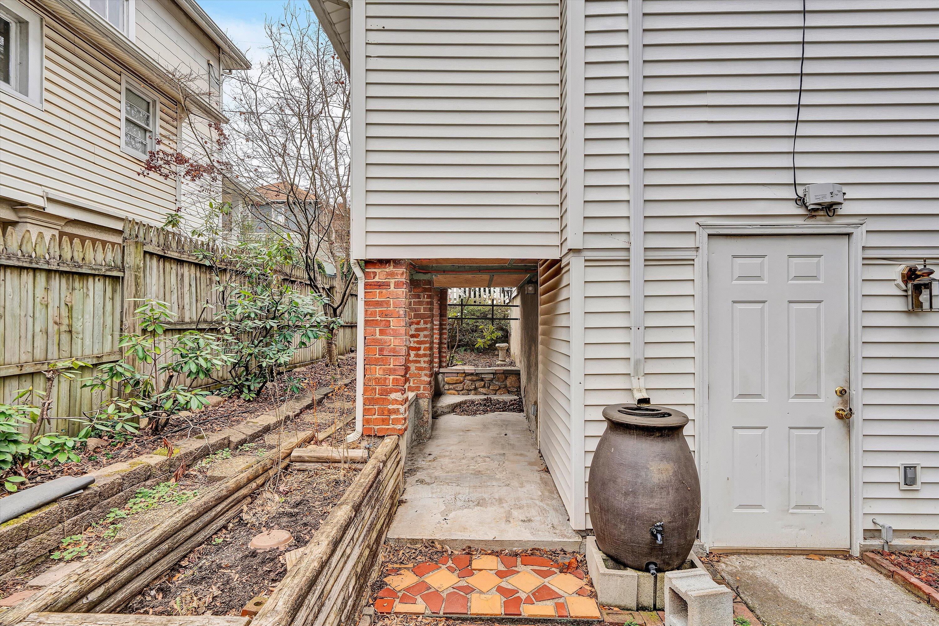 1609 6th Street Southwest Roanoke, VA 24016 - Photo 36 of 43 a view of a balcony with chairs and wooden floor