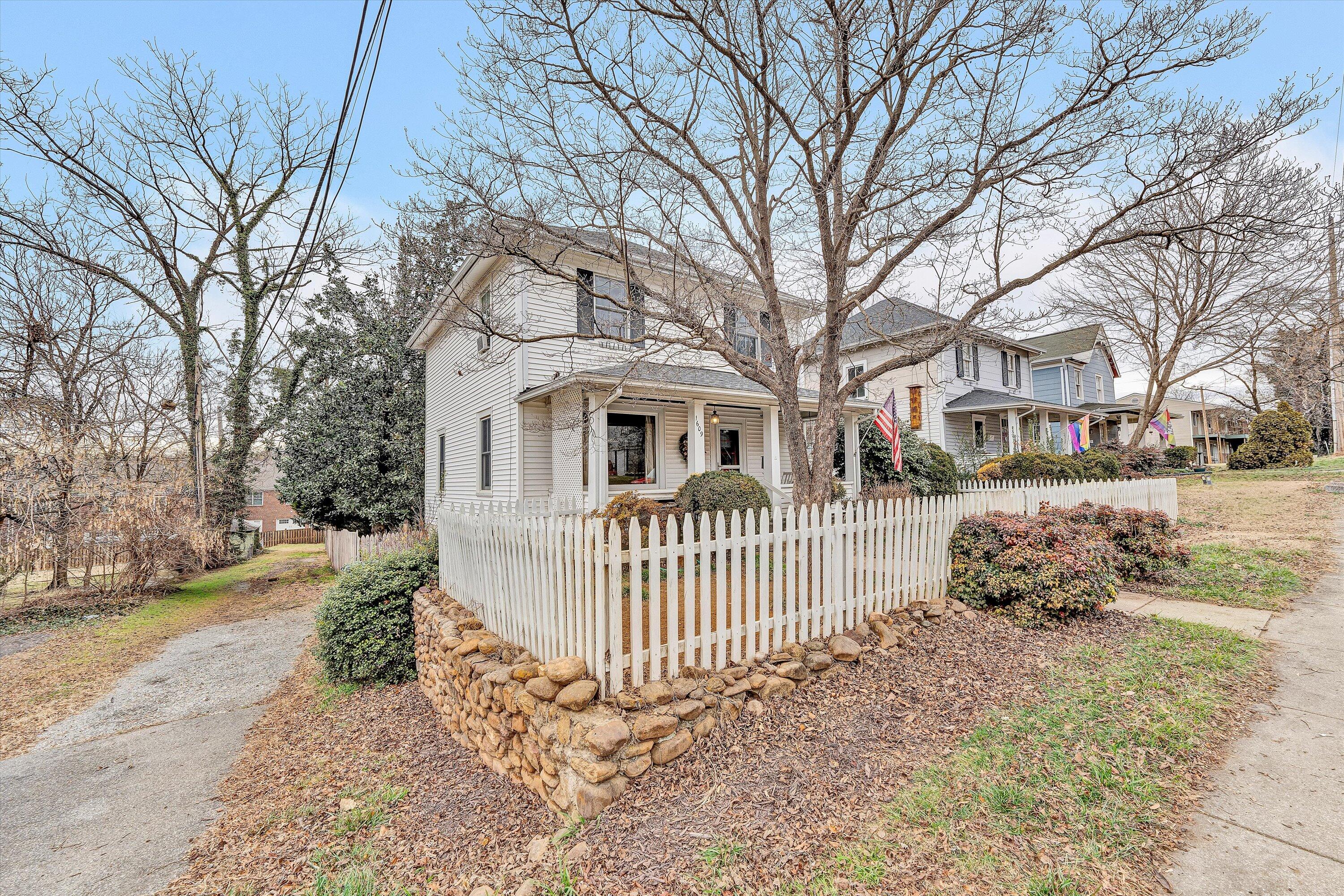 1609 6th Street Southwest Roanoke, VA 24016 - Photo 4 of 43 a white house that has tree in front of it