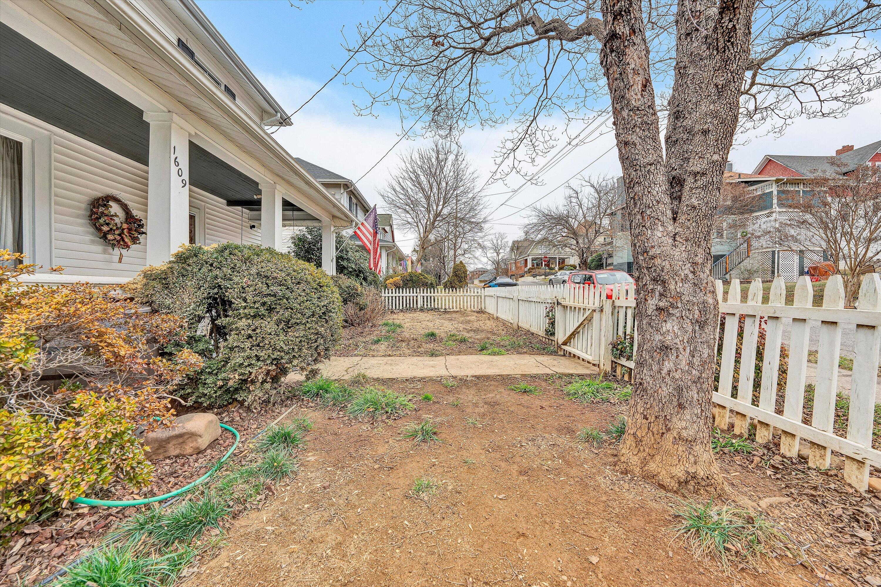 1609 6th Street Southwest Roanoke, VA 24016 - Photo 8 of 43 a view of a yard with a house