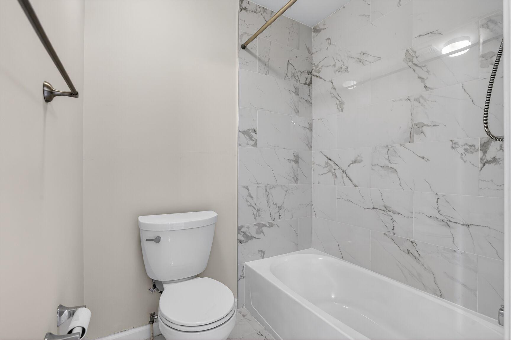 25845 Spring Farm Circle Chantilly, VA 20152 - Photo 36 of 57 Jack-and-Jill bath updated with designer tile.