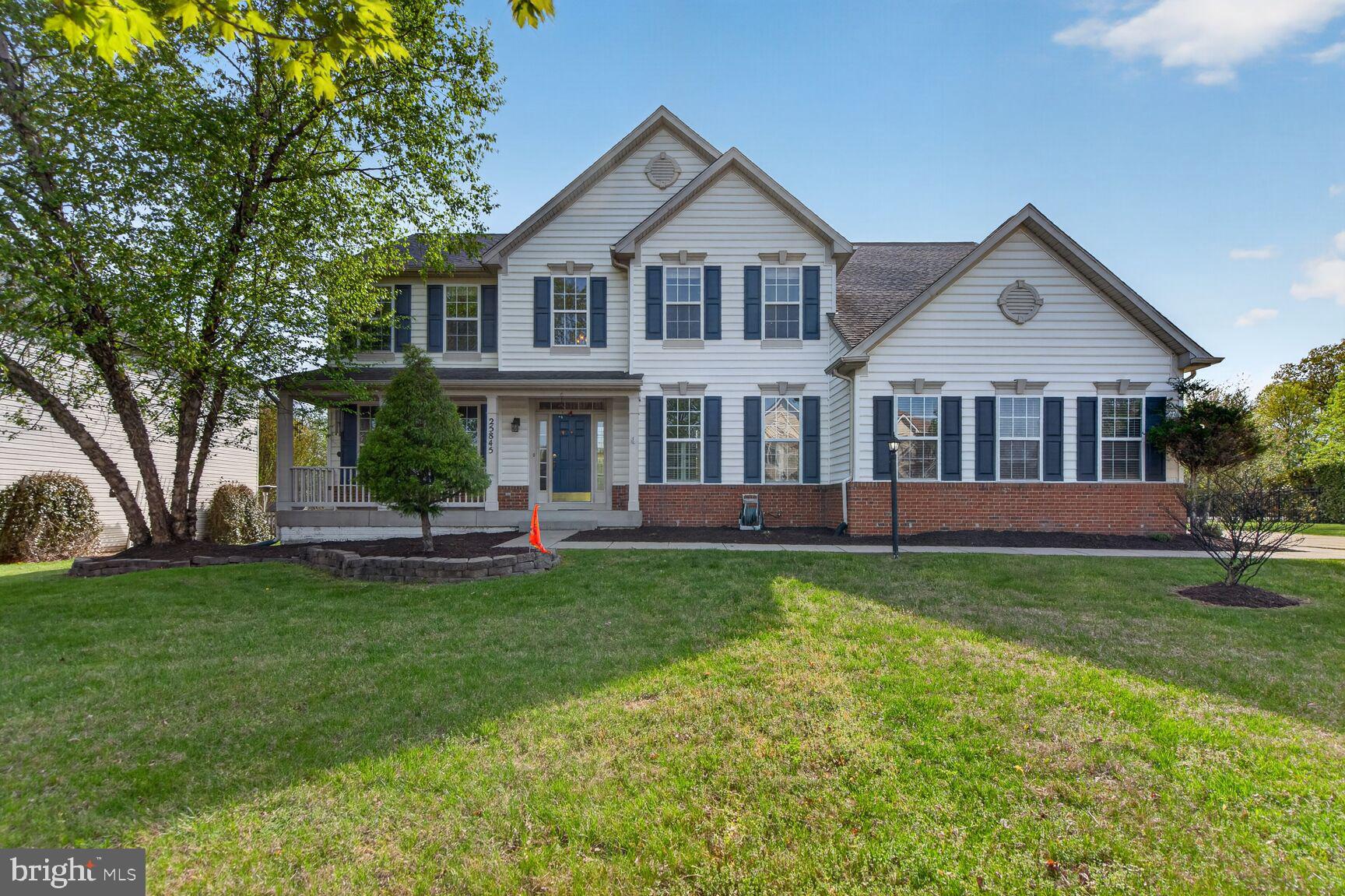 25845 Spring Farm Circle Chantilly, VA 20152 - Photo 47 of 57 Charming home with lush green lawn.
