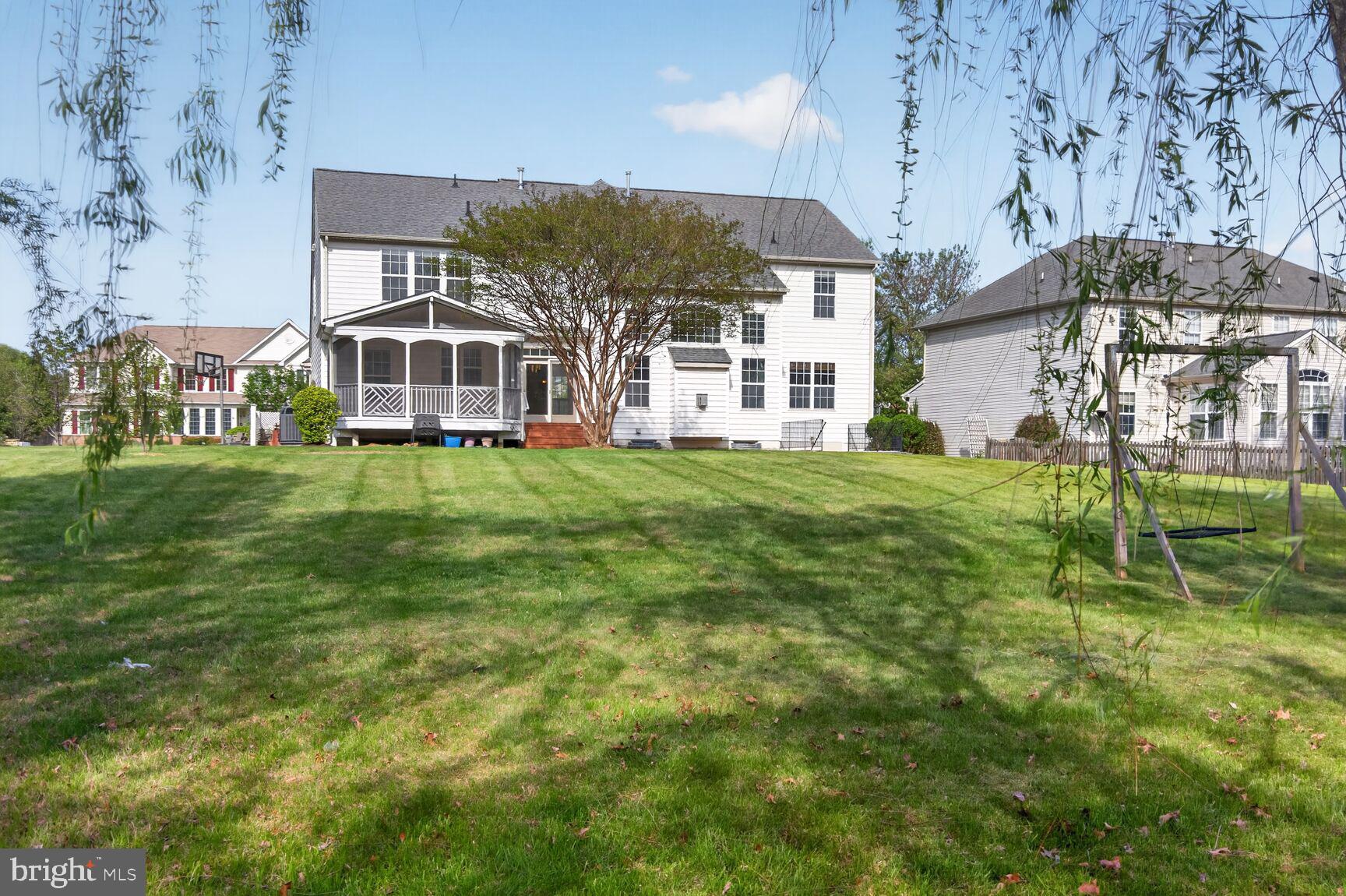 25845 Spring Farm Circle Chantilly, VA 20152 - Photo 51 of 57 Spacious backyard with charming home.