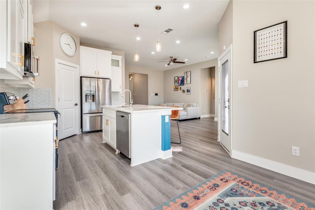 1210 Morrell Avenue Dallas, TX 75203 - Photo 14 of 28 a view of kitchen with cabinets and stainless steel appliances