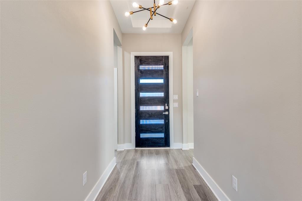 1210 Morrell Avenue Dallas, TX 75203 - Photo 3 of 28 a view of an empty room with a hallway