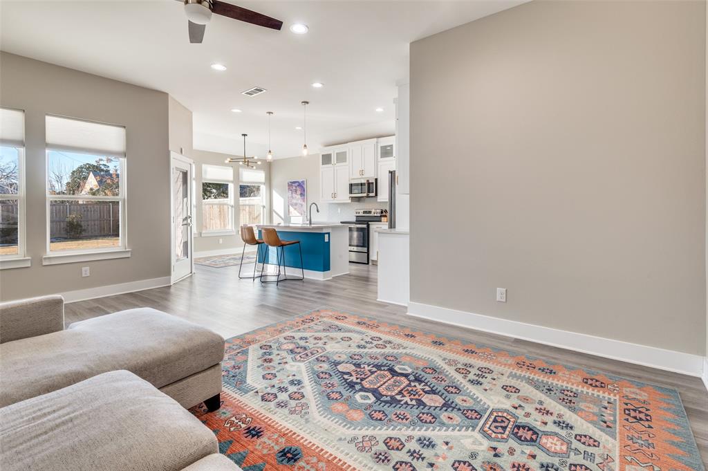 1210 Morrell Avenue Dallas, TX 75203 - Photo 7 of 28 a living room with furniture and a rug