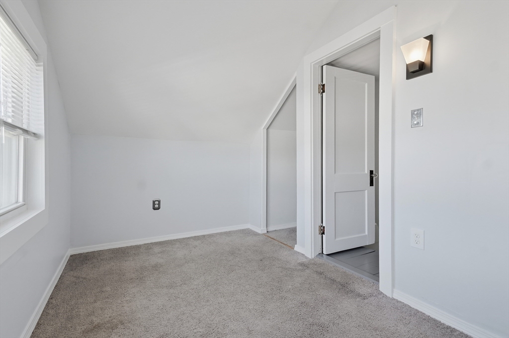 55 Addison Avenue Lynn, MA 01902 - Photo 11 of 23 an empty room with windows and closet