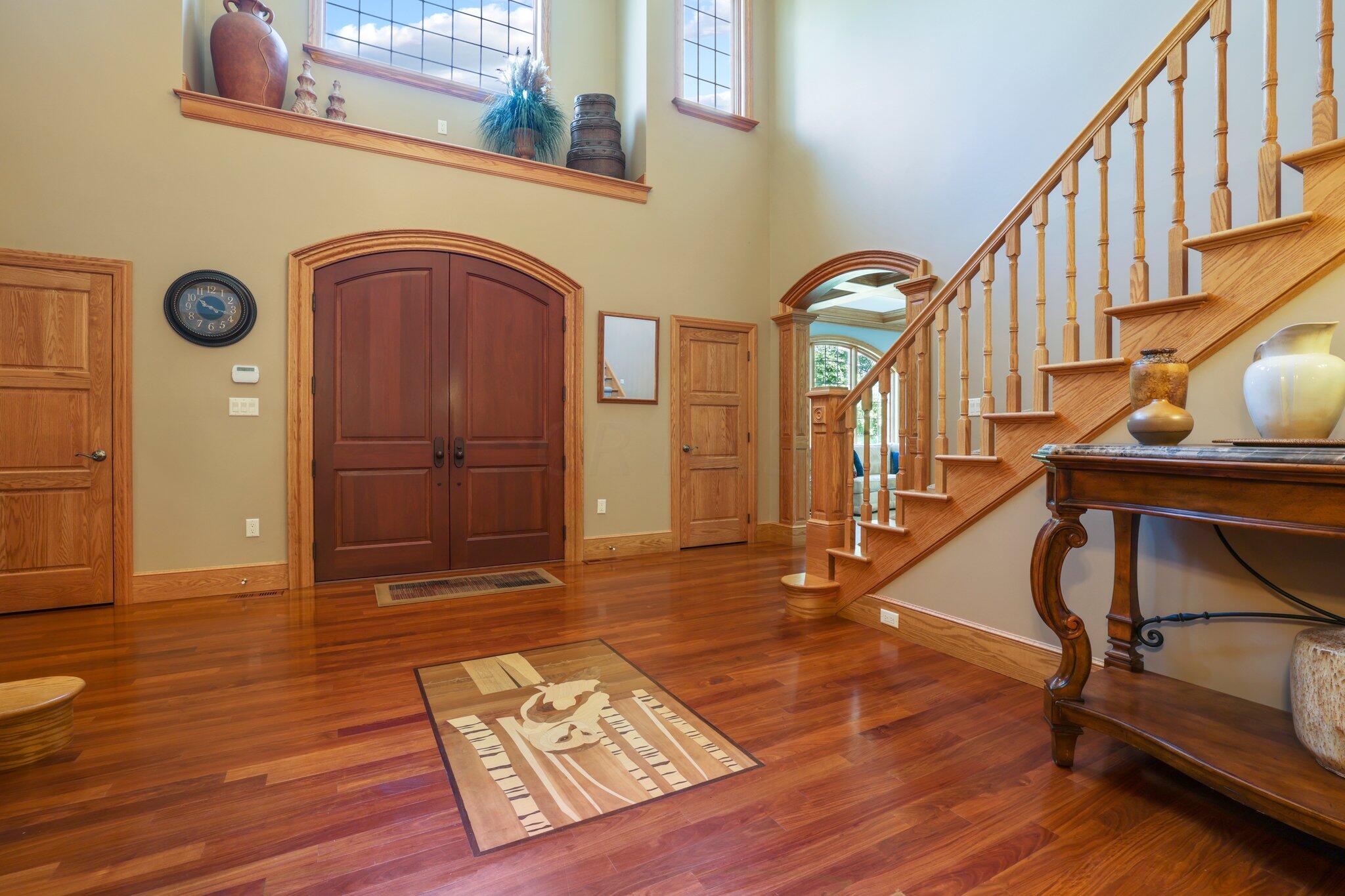 6201 Wilson Road Butler, OH 44822 - Photo 8 of 59 Santos Mahogany Flooring and loads of natural light