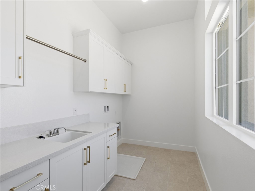 11850 Red Hawk Lane Porter Ranch, CA 91326 - Photo 46 of 51 Laundry Room: Fernwood Italianate - The Ridge Collection at Bella Vista - Homesite 68