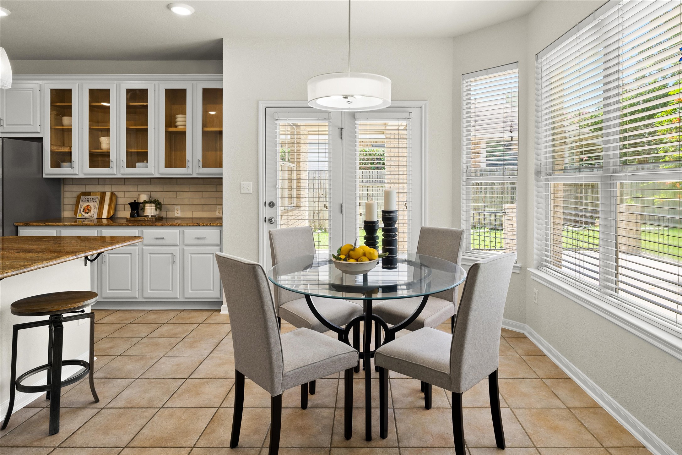 3416 Oxsheer Drive Austin, TX 78732 - Photo 12 of 39 Back door to the covered patio just off the kitchen