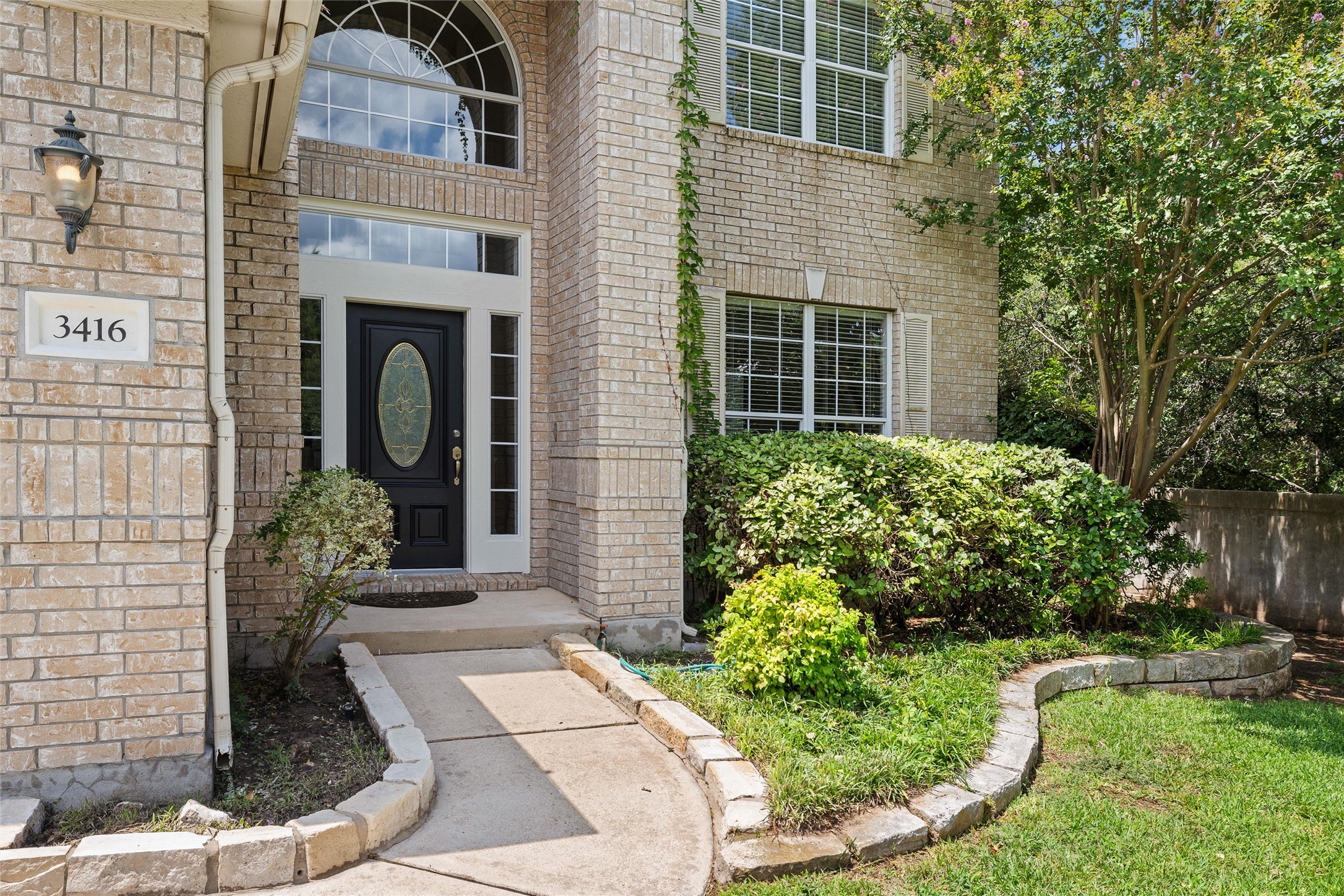 3416 Oxsheer Drive Austin, TX 78732 - Photo 5 of 39 Greet your guests at this welcoming front porch