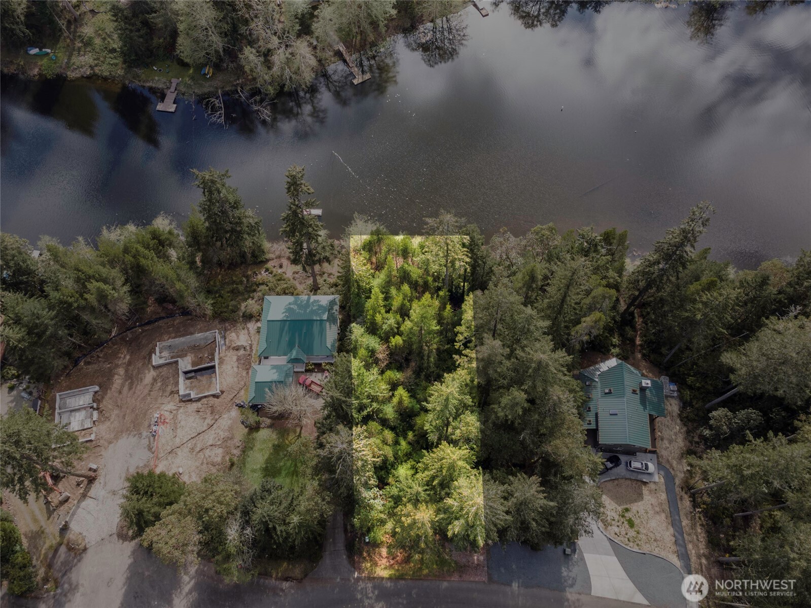 11018 Matthews Way Anderson Island, WA 98303 - Photo 4 of 19 an aerial view of a house with a yard
