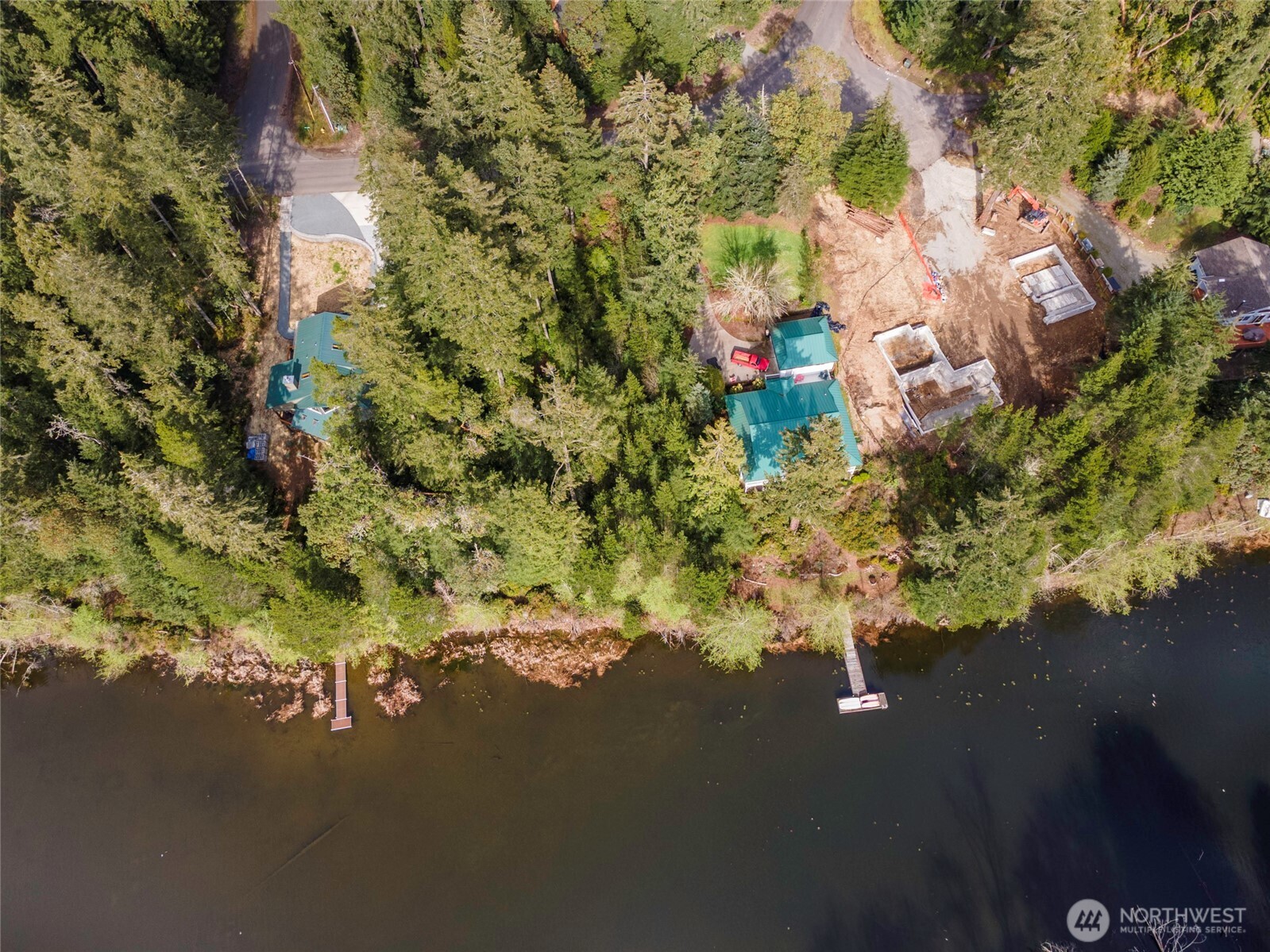 11018 Matthews Way Anderson Island, WA 98303 - Photo 5 of 19 a picture of street with side of building