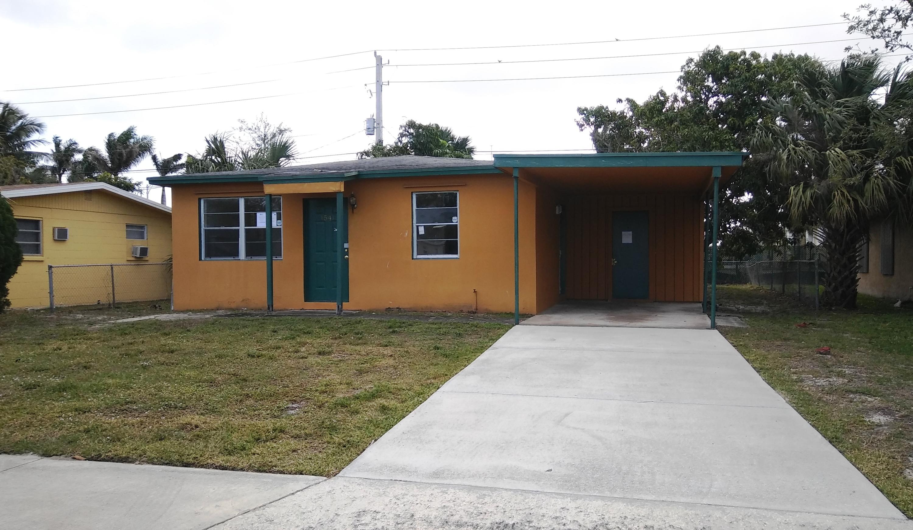 1541 West 9th Street Riviera Beach, FL 33404 - Photo 1 of 11 front