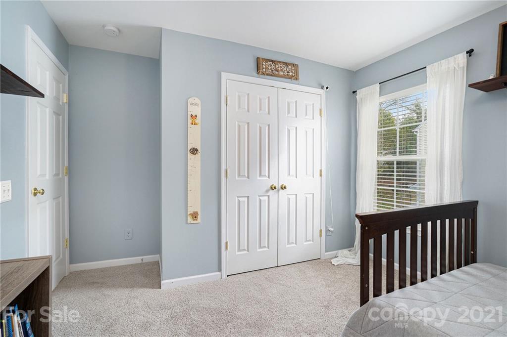 9379 Hillston Ridge Road Huntersville, NC 28078 - Photo 18 of 38 a view of a livingroom with a bedroom