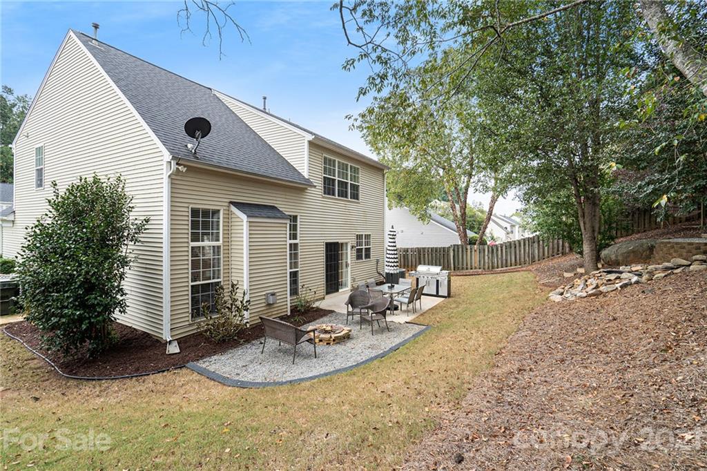 9379 Hillston Ridge Road Huntersville, NC 28078 - Photo 29 of 38 a view of a house with backyard and sitting area