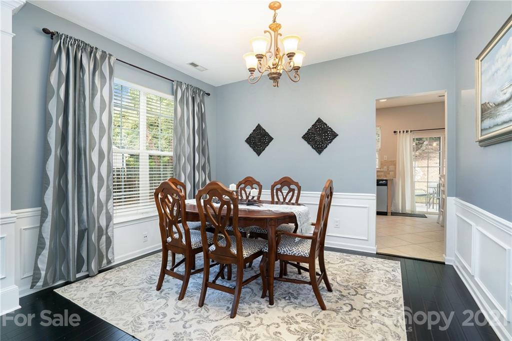 9379 Hillston Ridge Road Huntersville, NC 28078 - Photo 4 of 38 a view of a dining room with furniture window and wooden floor