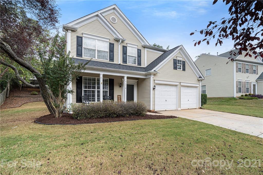 9379 Hillston Ridge Road Huntersville, NC 28078 - Photo 34 of 38 a front view of a house with a garden