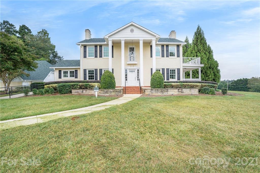 9379 Hillston Ridge Road Huntersville, NC 28078 - Photo 37 of 38 a front view of a house with a yard
