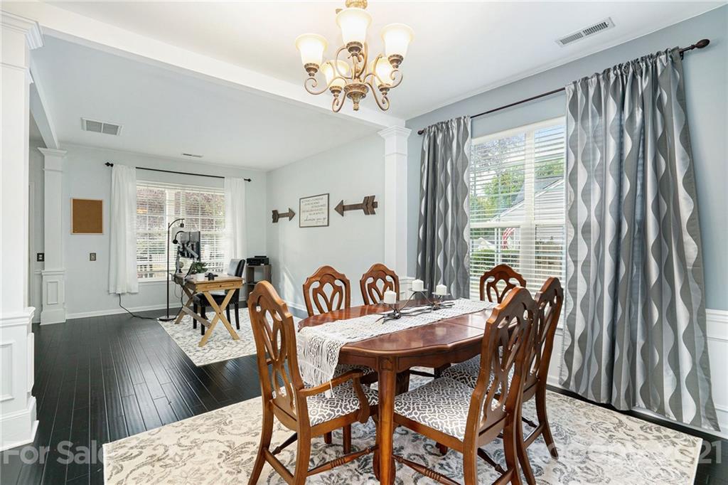 9379 Hillston Ridge Road Huntersville, NC 28078 - Photo 5 of 38 a view of a a dining room with furniture window and wooden floor