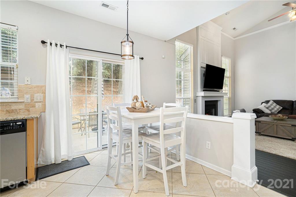9379 Hillston Ridge Road Huntersville, NC 28078 - Photo 10 of 38 a view of a dining room with furniture window and outside view